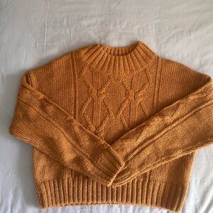 Brown cropped knit sweater